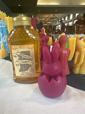 Happy Easter! Enjoy the vibrant beeswax candle in the color pink.