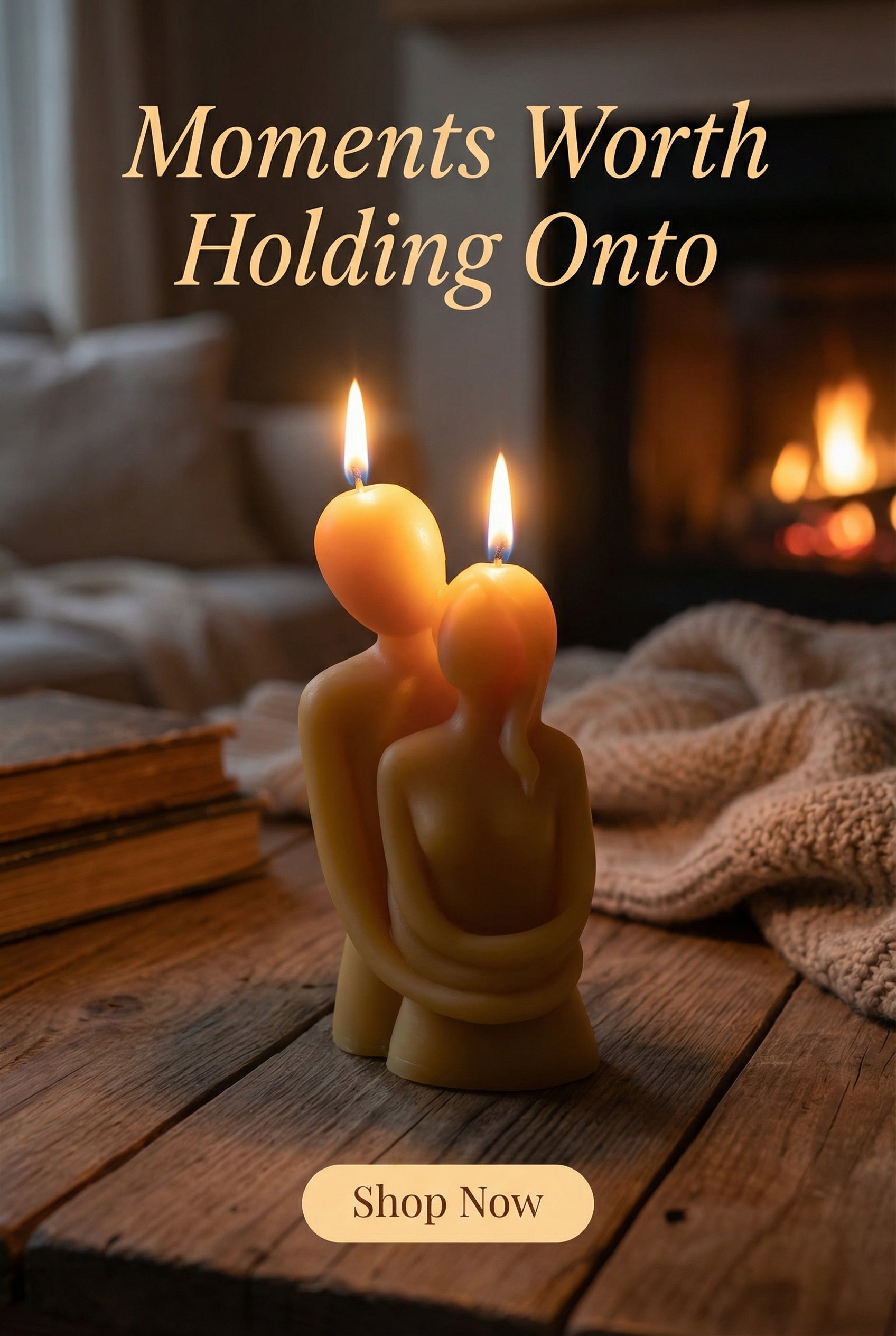 Two lit candles shaped like people on a wooden surface with a cozy background.