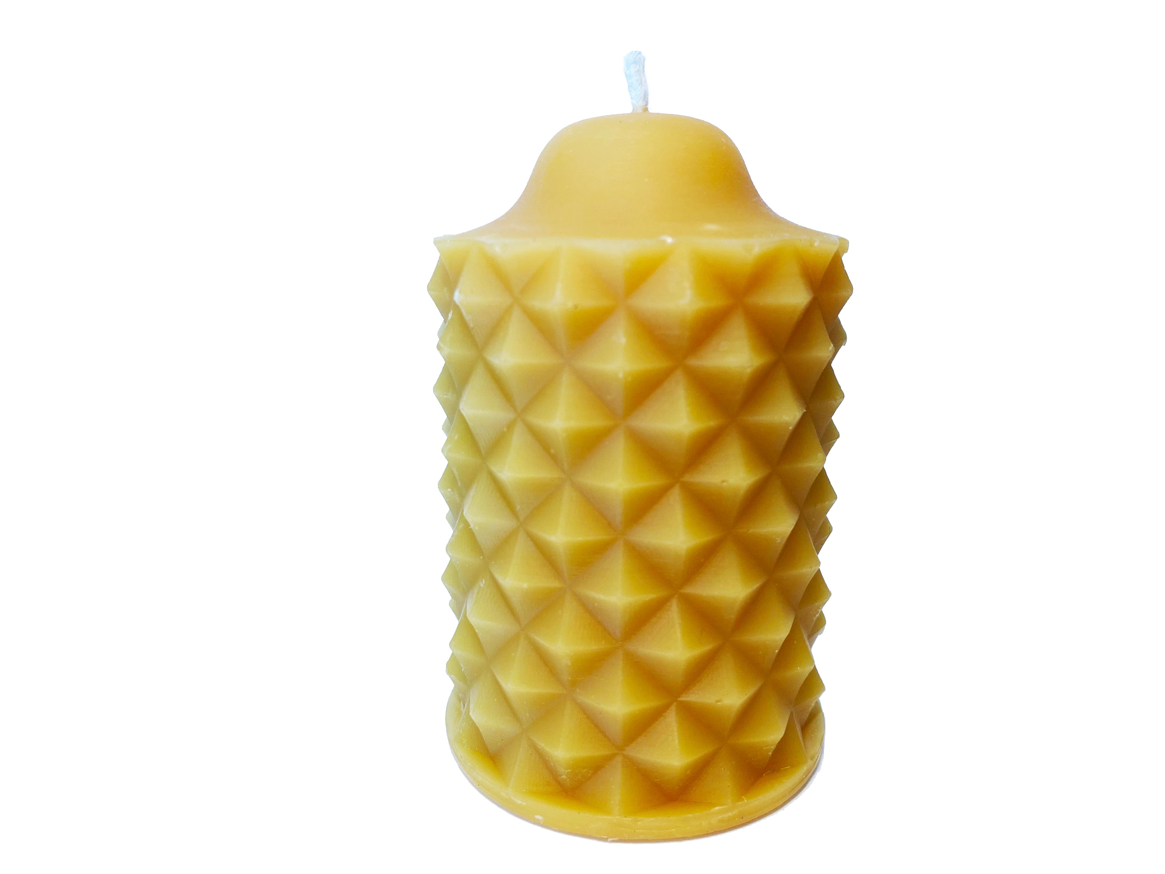 The scallop candle is a distinguished candle that is difficult to describe. Not surprisingly, the scallop beeswax candle is a best seller for Hardwood Honey.