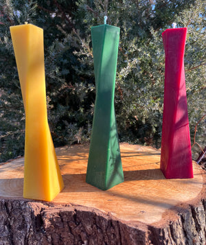 The evening dress beeswax candle has a color for every occasion. The red or the green evening dress make for a great centerpiece decoration.