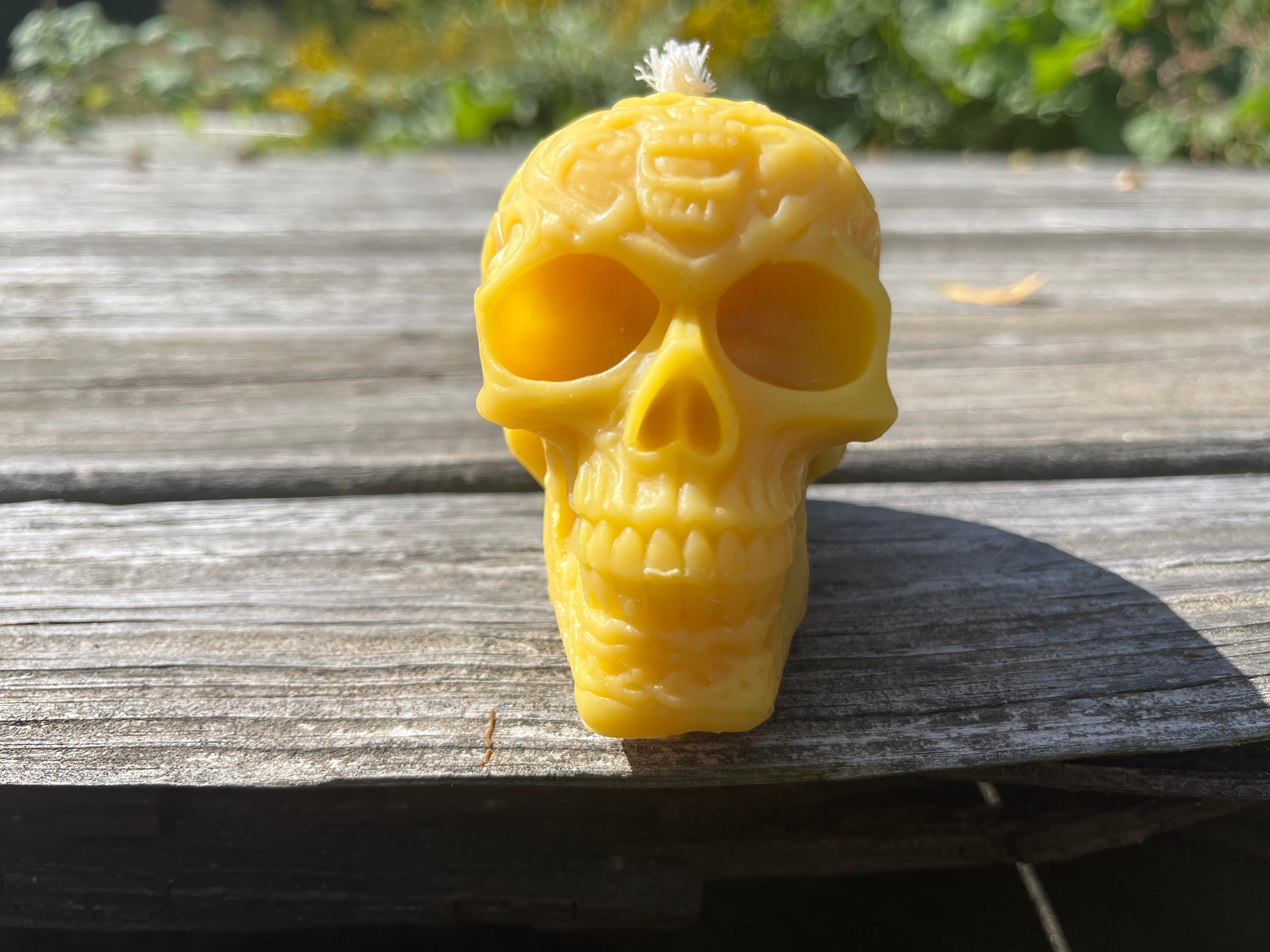 Front view of the Halloween skull candle. Poured by Hardwood Honey.