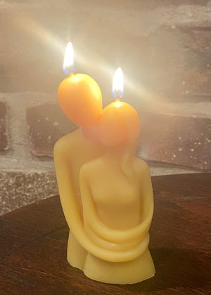 The embrace candle is lit. A thoughtful candle for date night at home.