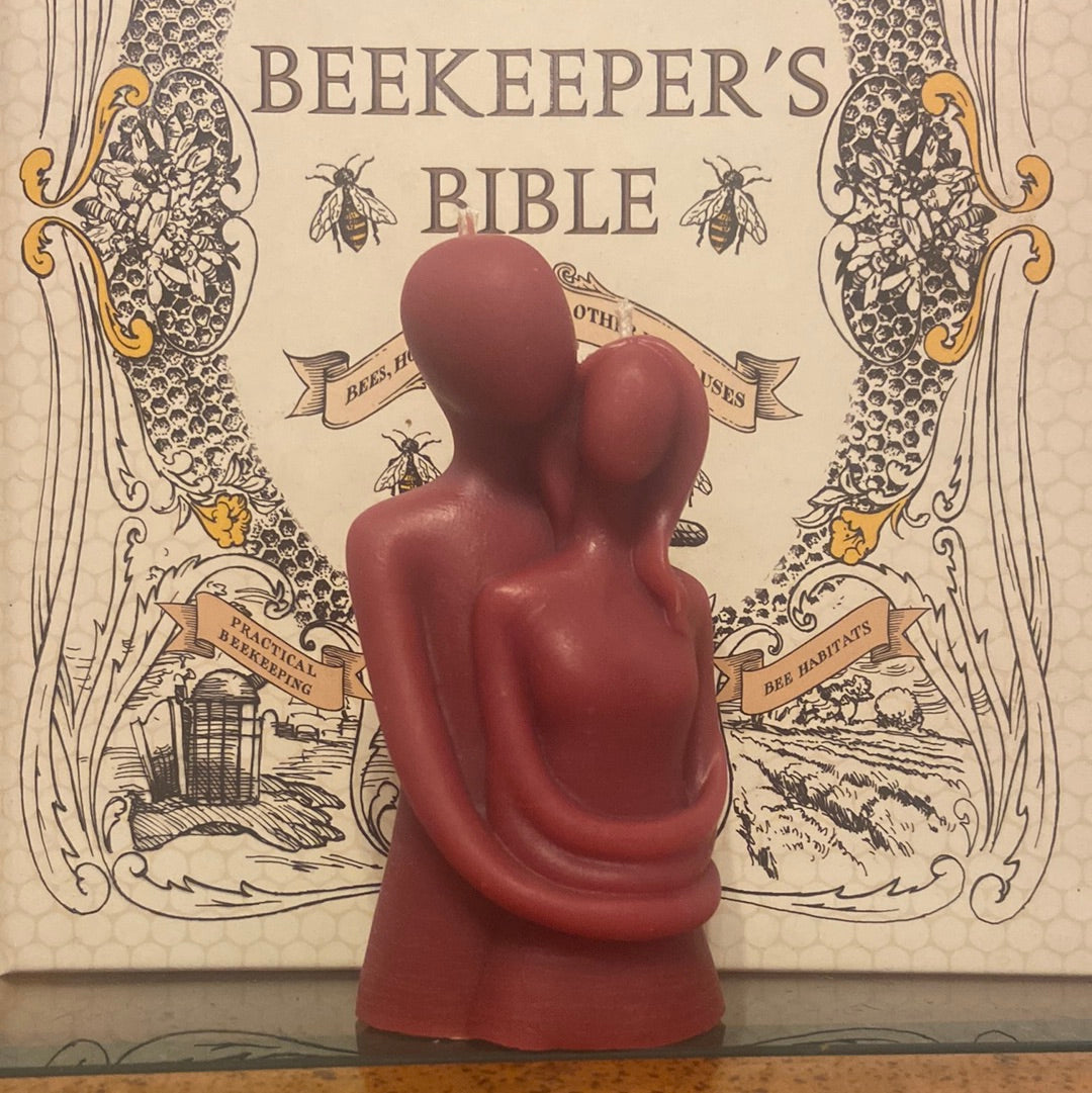 The embrace candle has two wicks. Express your bond with the perfect embrace. Comes in a variety of colors. Valentine's, Mother's Day, wedding anniversary.