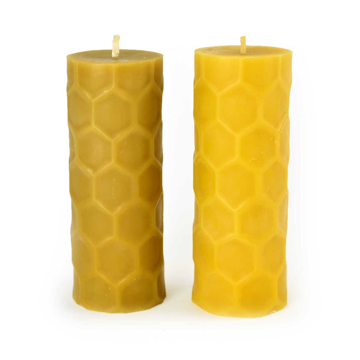 100% Indiana beeswax honeycomb candle. The hexagon pattern mimics the pattern of a beehive frame.