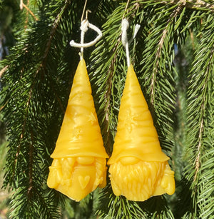 Shown in the natural beeswax color, the gnome couple are vibrant ornaments.