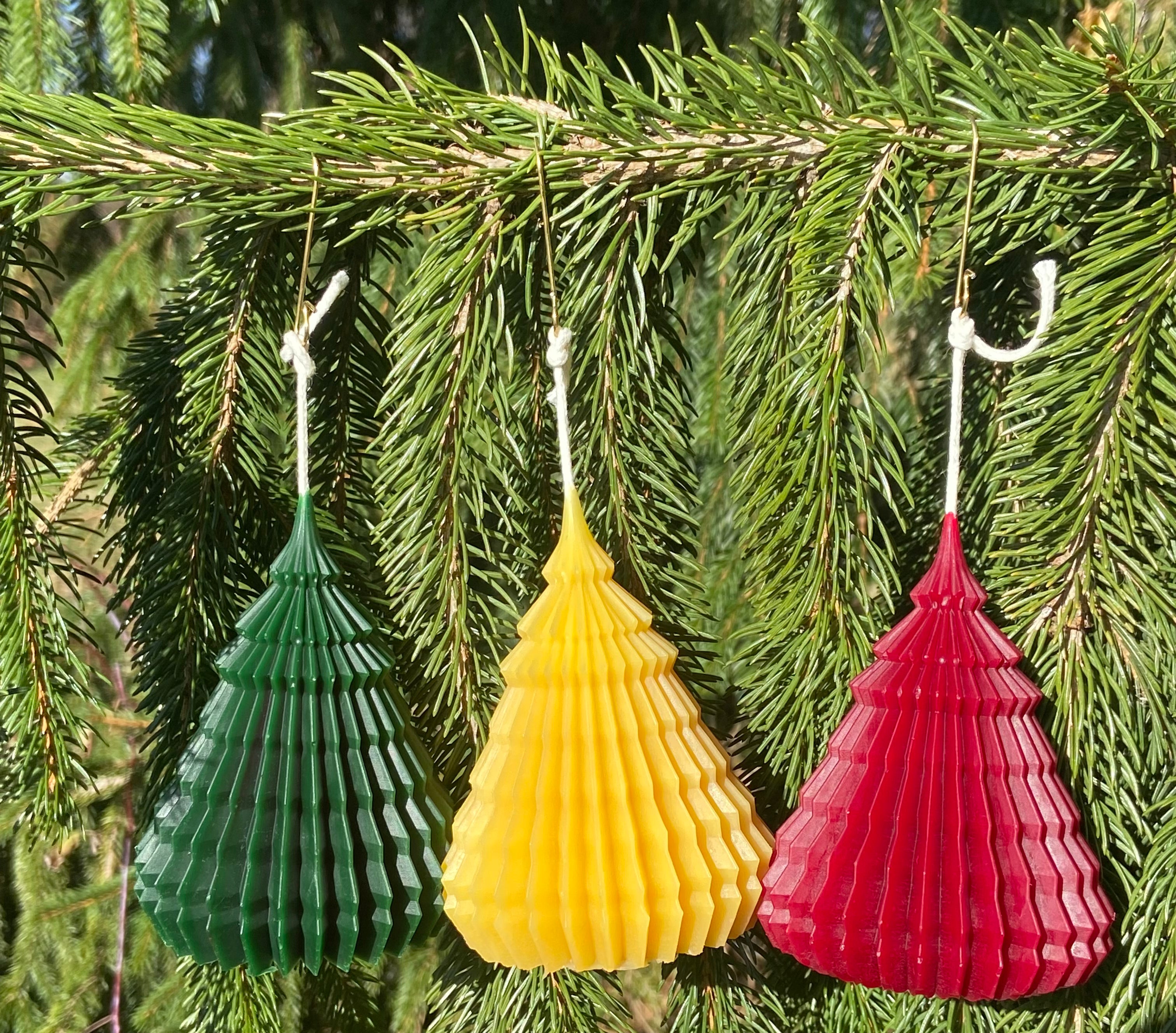 Appropriate on a Christmas tree or dining table. The origami candle is available in a variety of colors