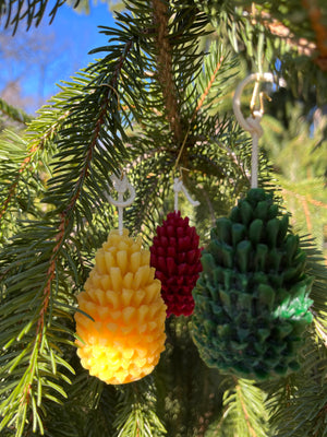 The pine cone is cute Christmas tree ornament. And when ready to light the pine cones are superb dining table décor.