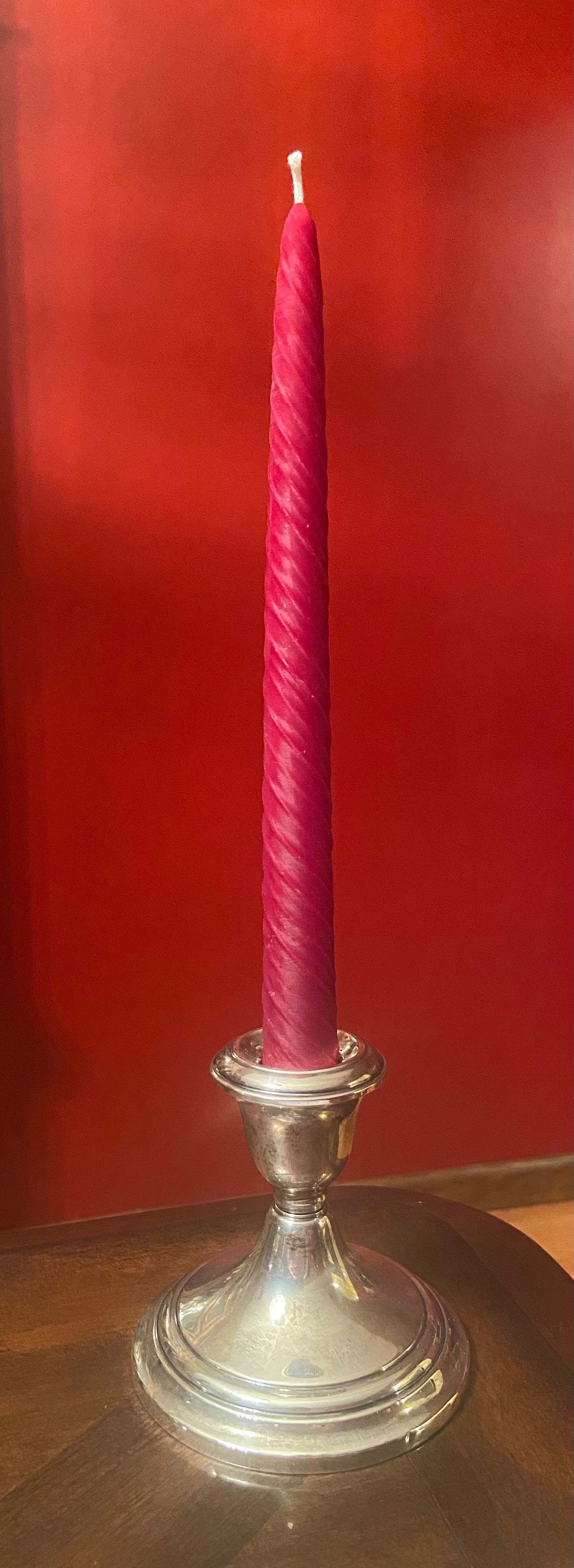 Hardwood Honey offers the spiral taper candle in the color red for Christmas.