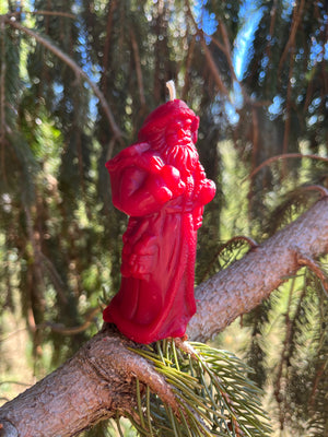 The small Santa candle will come as an ornament. The picture shows where to cut the wick in order to light. About a quarter inch about the candle.