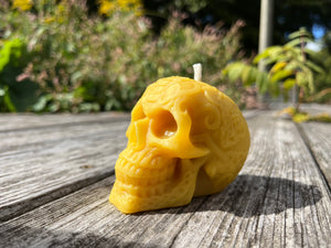 Trick or treat with a smile. This Halloween candle smiles for candy.