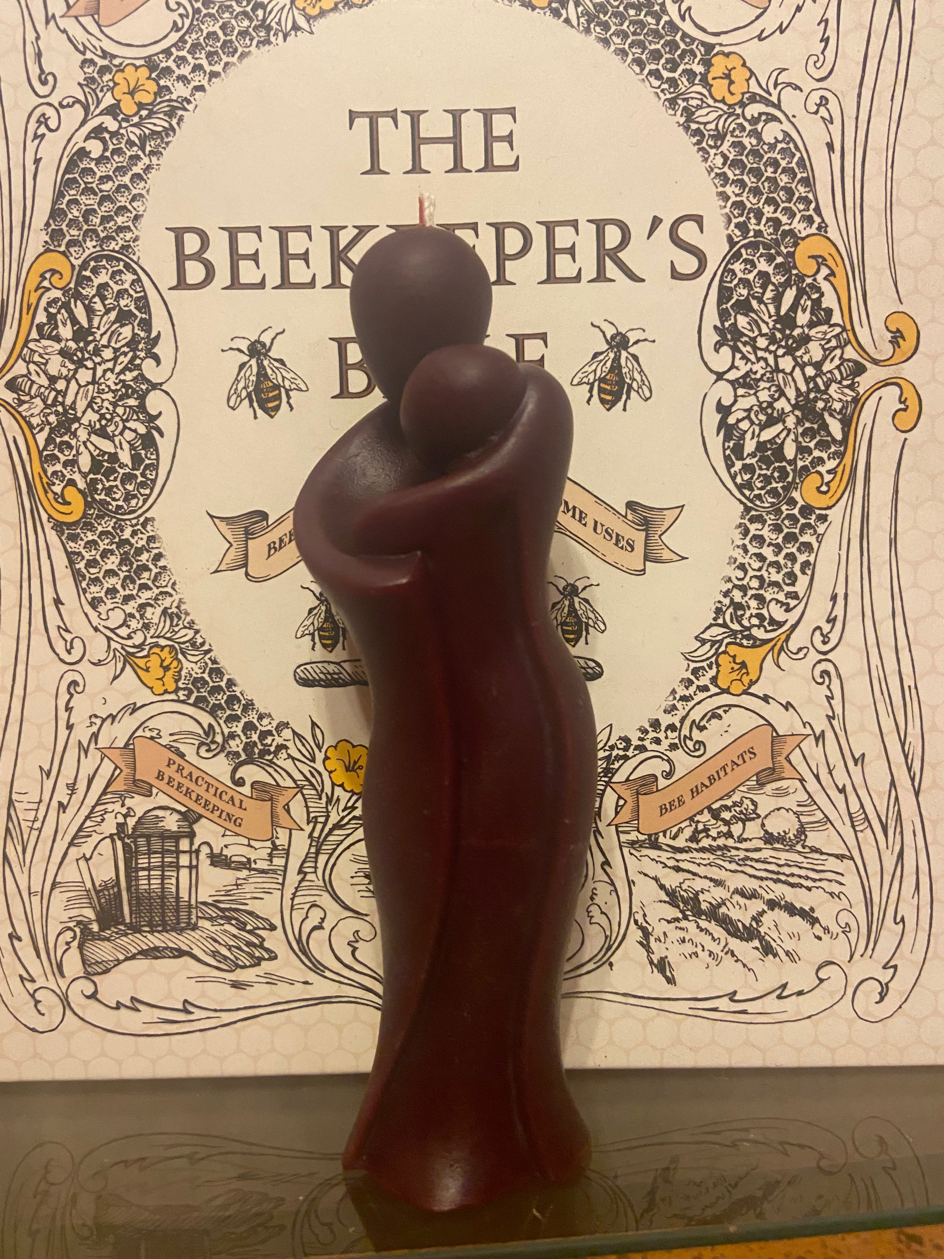 The TLC candle is made from Indiana beeswax. This color specifically is merlot.