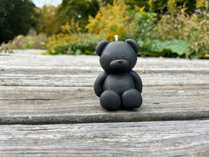 Teddy bear candle poured with 100% Indiana beeswax. The teddy bear comes in a variety of colors. Shown is the color black.