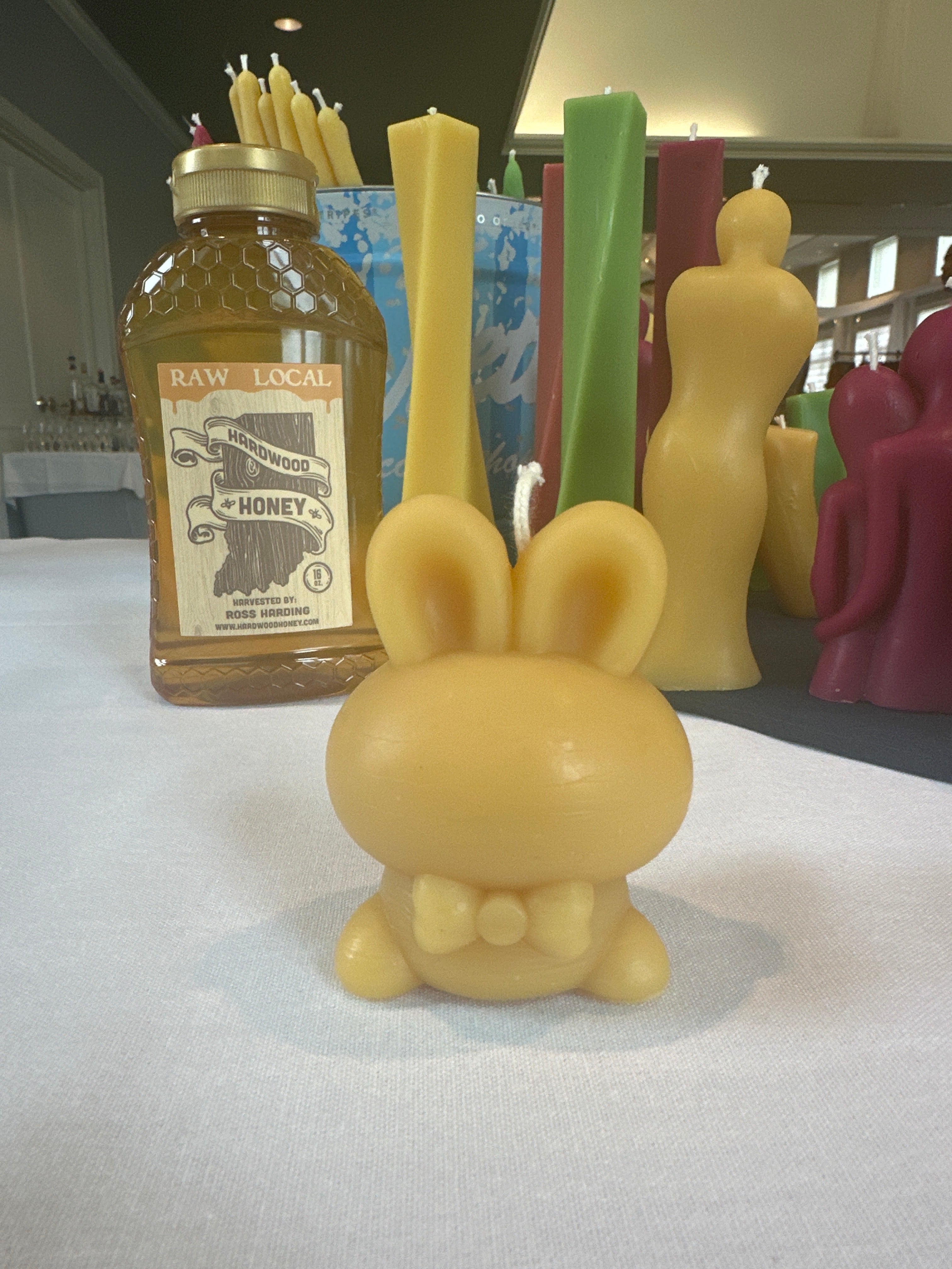Too cute to lite. The bow tie makes you want to pinch the floppy ears.
